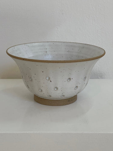 m. bueno Colander