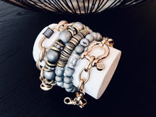 Load image into Gallery viewer, Eye Candy Matte hematite and African disk beaded bracelet
