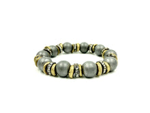 Load image into Gallery viewer, Eye Candy Matte hematite and African disk beaded bracelet